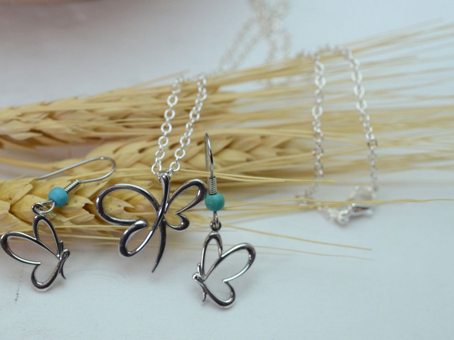 Side Profile Butterfly Pendant and Earrings Set in Sterling Silver