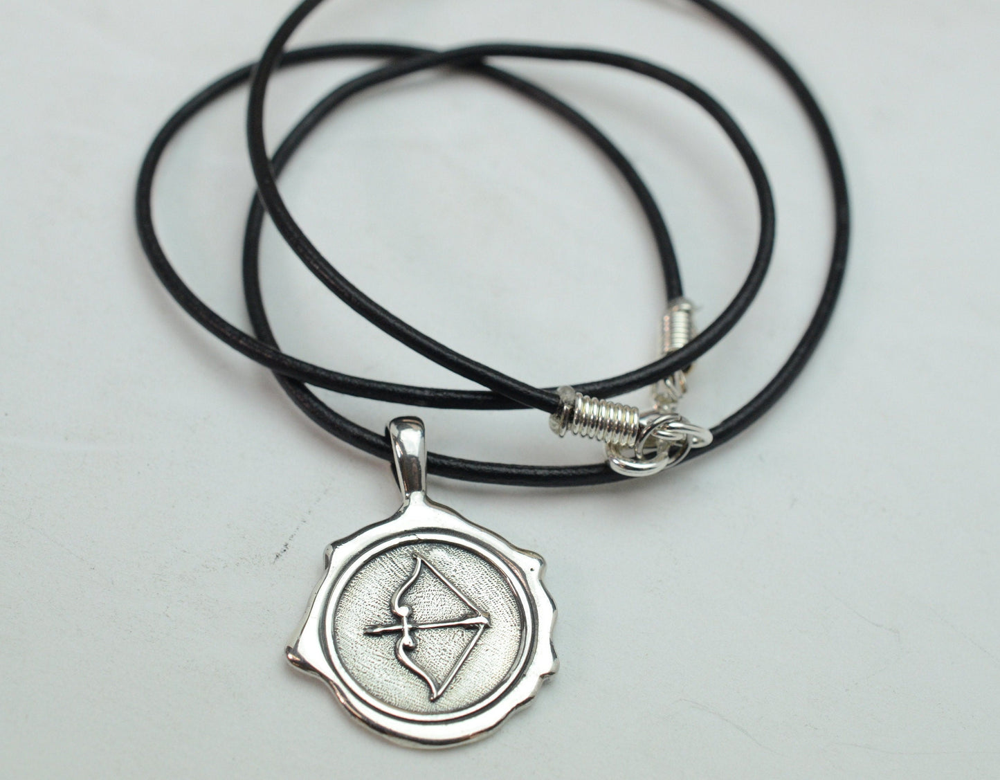 Men's Bow and Arrow Pendant in Sterling Silver with Leather Cord – Lakota Legacy Line