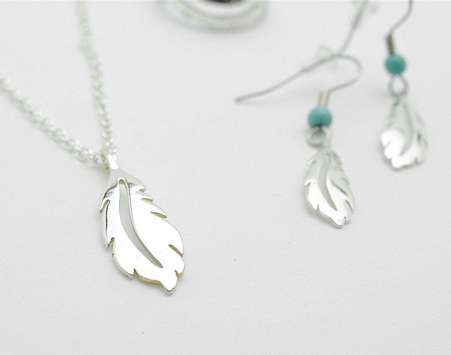 Open Feather Pendant and Earrings in Sterling Silver with Turquoise Accent Bead Set – Lakota Legacy Line