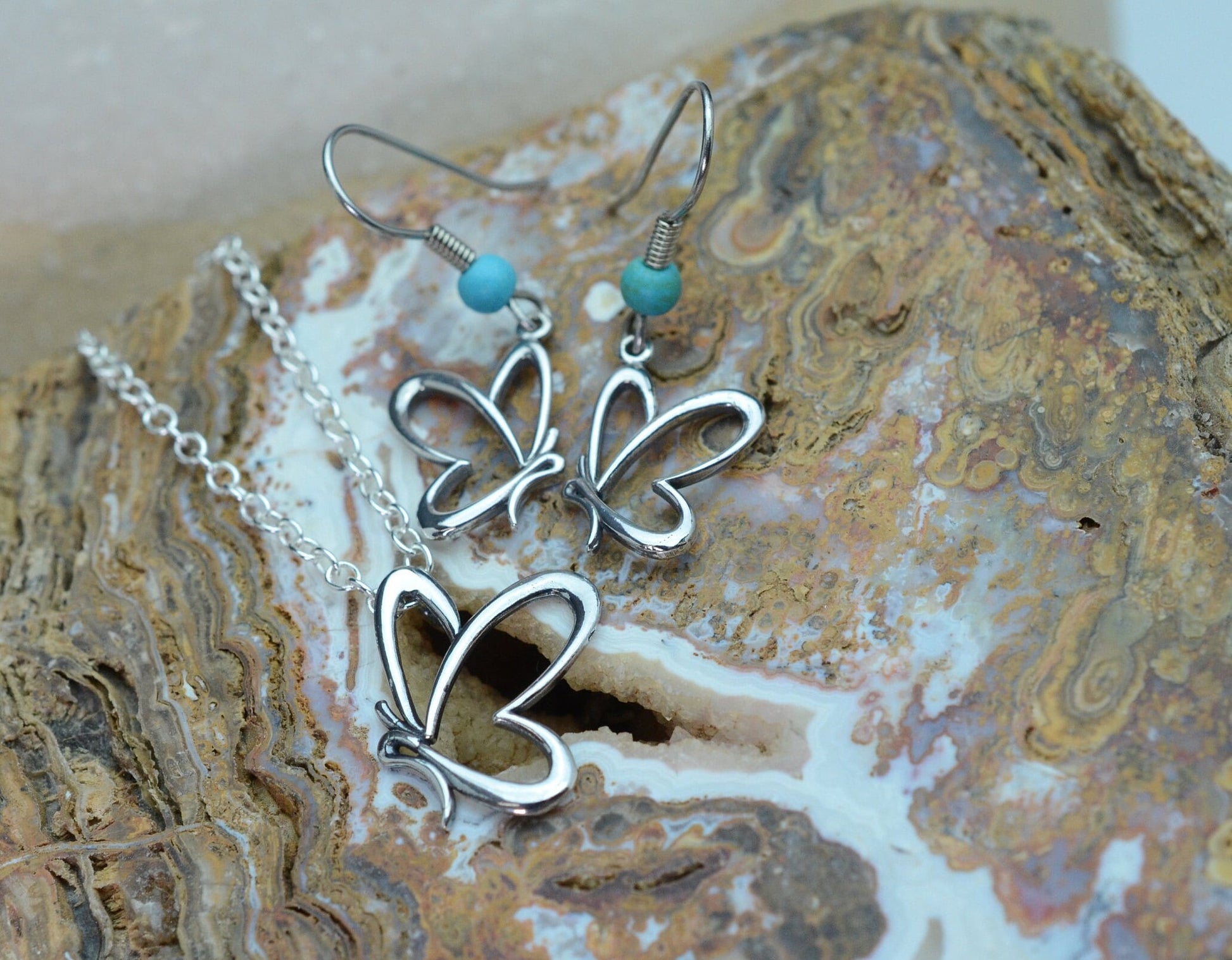 Side Profile Butterfly Pendant and Earrings Set in Sterling Silver