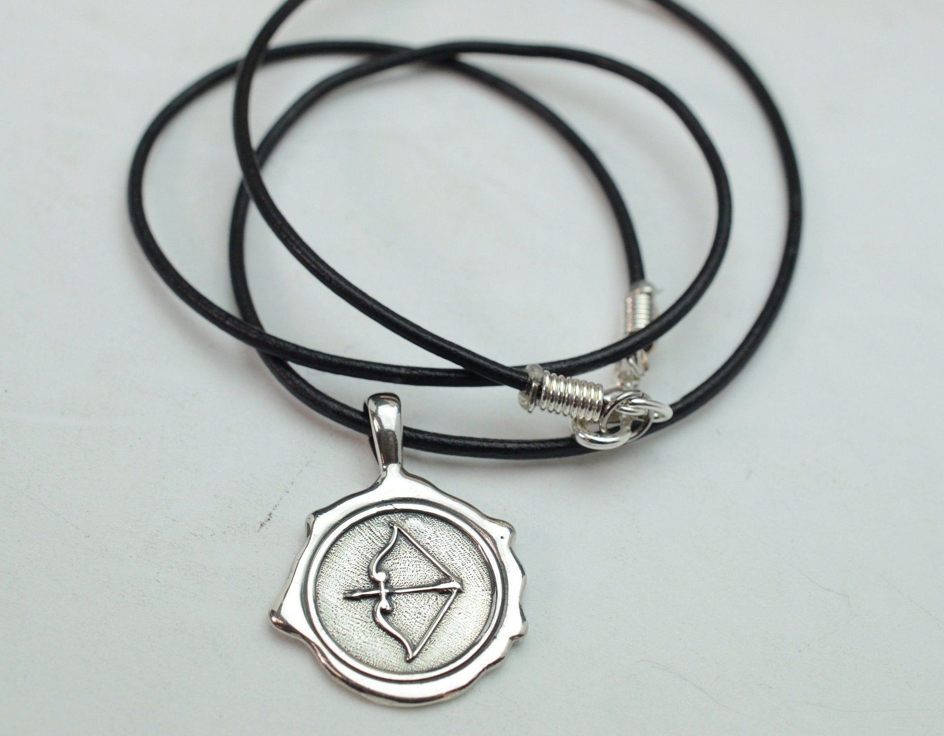 Men's Bow and Arrow Pendant in Sterling Silver with Leather Cord – Lakota Legacy Line